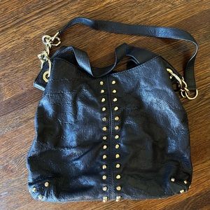 Michael Kors studded black leather purse.